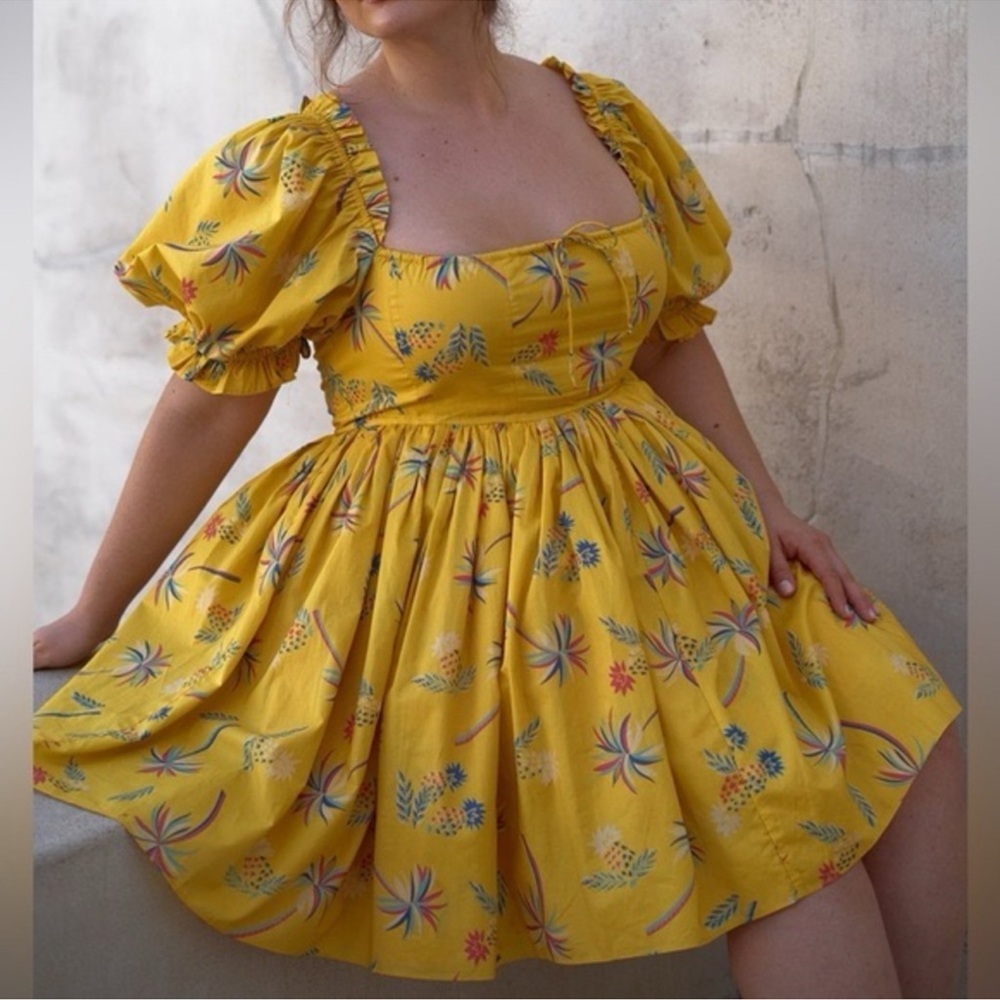 Brand new with tags Selkie Beach Day Dress in Piña Colada. Size extra small.